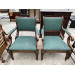 A PAIR OF REGENCY STYLE OPEN ARMCHAIRS ONT URNED AND FLUTED LEGS, SCROLL ARMS AND BACK
