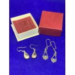 TWO PAIRS OF SILVER EARRINGS ONE TEARDROP STYLE AND ONE NAVAJO DESIGN