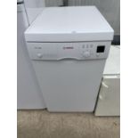 A WHITE BOSCH SLIMLINE DISHWASHER BELIEVED IN WORKING ORDER BUT NO WARRANTY