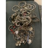 A SELECTION OF WHITE METAL JEWELLERY TO INCLUDE SEVERAL BANGLES