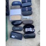 AN ASSORTMENT OF NAMED SUNGLASSES AND GLASSES CASES