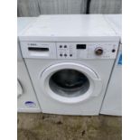 A WHITE BOSCH VARIOPERFECT WASHING MACHINE BELIEVED IN WORKING ORDER BUT NO WARRANTY