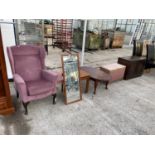 A WINGED CHAIR, MIRROR, STOOL, NEST OF TABLES, OVAL COFFEE TABLE, OTTOMAN AND A UNIT