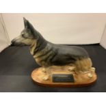 A BESWICK ALSATION GERMAN SHEPHERD DOG ON A PLINTH