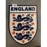 A CAST METAL 'ENGLAND' THREE LIONS SIGN 30CM X 22CM