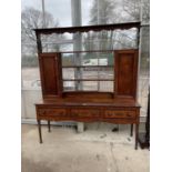 A GEORGE III OAK AND CROSSBANDED DRESSER WITH OVAL SHELL ENLAYS, THREE DRAWERS, ON TURNED LEGS, WITH
