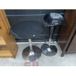 A BLACK PUMP ACTION KITCHEN STOOL ON CHROME BASE AND A SLIMLINE TABLE, 21" DIAMETER