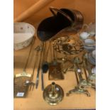 A LARGE QUANTITY OF BRASSWARE TO INCLUDE A COPPER COAL SCUTTLE ETC