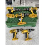 A COLLECTION OF FIVE DEWALT DRILLS WITHOUT BATTERIES