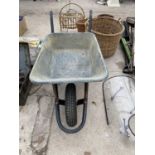 A MODERN METAL WHEEL BARROW