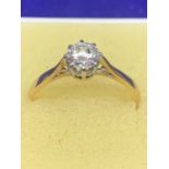 AN 18 CARAT YELLOW GOLD RING WITH A SOLITAIRE DIAMOND BELIEVED 0.5 - 0.65 CARAT SIZE N/O GROSS