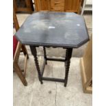 AN EBONISED BARLEYTWIST OCCASIONAL TABLE