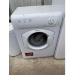 A WHITE HOTPOINT 6KG TUMBLE DRYER BELIEVED IN WORKING ORDER BUT NO WARRANTY