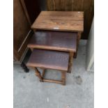 AN OAK NEST OF THREE TABLES