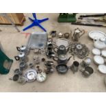 A LARGE ASSORTMENT OF SILVER PLATE AND PEWTER ITEMS TO INCLUDE TANKARDS, JUGS AND TEAPOTS ETC
