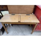 A CHILDS DOUBLE SCHOOL DESK BY KINGFISHER LTD. WEST BROMICH, 36" WIDE