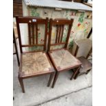 A PAIR OF MAHOGANY RUSH SEATED BEDROOM CHAIRS