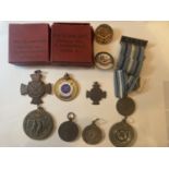 ELEVEN VARIOUS MEDALS FOR SWIMMING AND LIFE SAVING ETC DATED BACK TO 1945