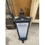 A VINTAGE 'MARSTONS' CAST IRON OUTSIDE LAMP