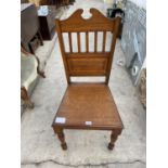 A SINGLE VICTORIAN OAK HALL CHAIR