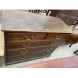 A 19TH CENTURY OAK CHEST OF TWO SHORT AND THREE GRADUATED DRAWERS, 42" WIDE