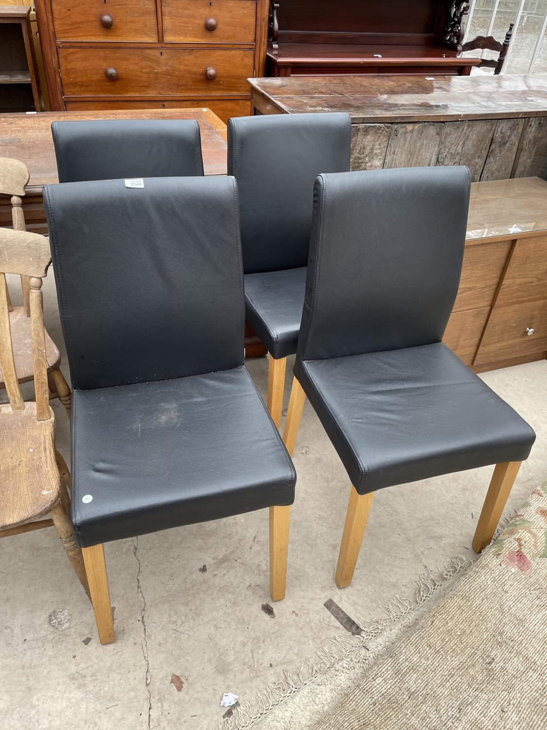 FOUR HABITAT (OSLO) FAUX LEATHER DINING CHAIRS ON OAK LEGS