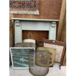 AN ASSORTMENT OF FIRE SIDE ITEMS TO INCLUDE A WOODEN FIRE SURROUND AND VARIOUS DECORATIVE FIRE