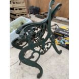A PAIR OF DECORATIVE CAST IRON BENCH ENDS WITH LION HEAD HANDLES