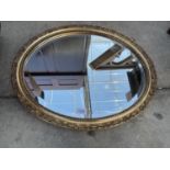 ON OVAL GILT FRAMED BEVEL EDGE MIRROR