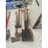 AN ASSORTMENT OF VINTAGE GARDEN TOOLS TO INCLUDE SHOVELS, FORKS AND AXES ETC
