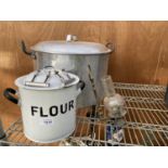 AN ENAMEL FLOUR TIN, A VINTAGE AND LARGE STAINLESS STEEL COOKING POT