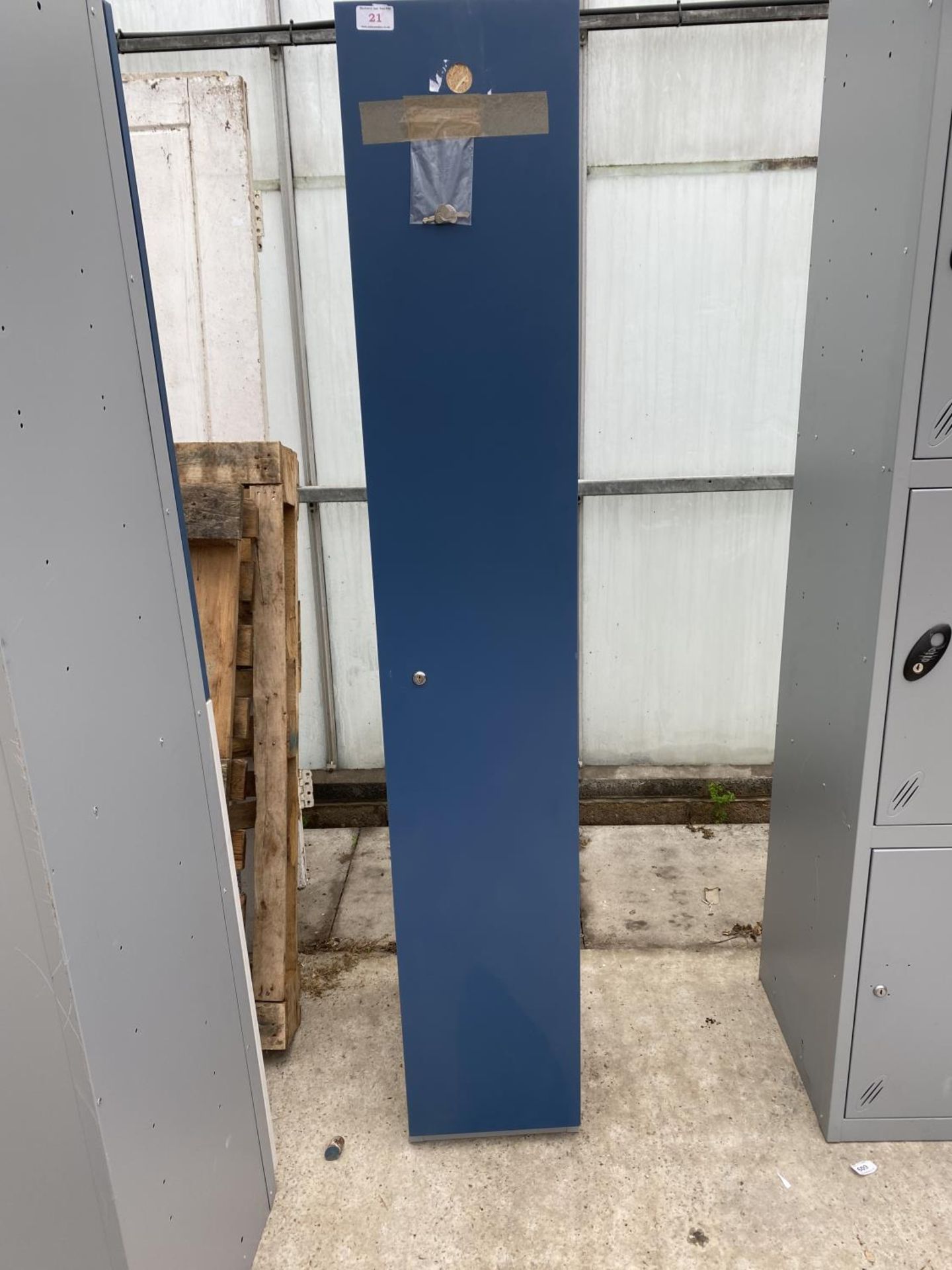 A 6FT HIGH LOCKER WITH KEY +VAT