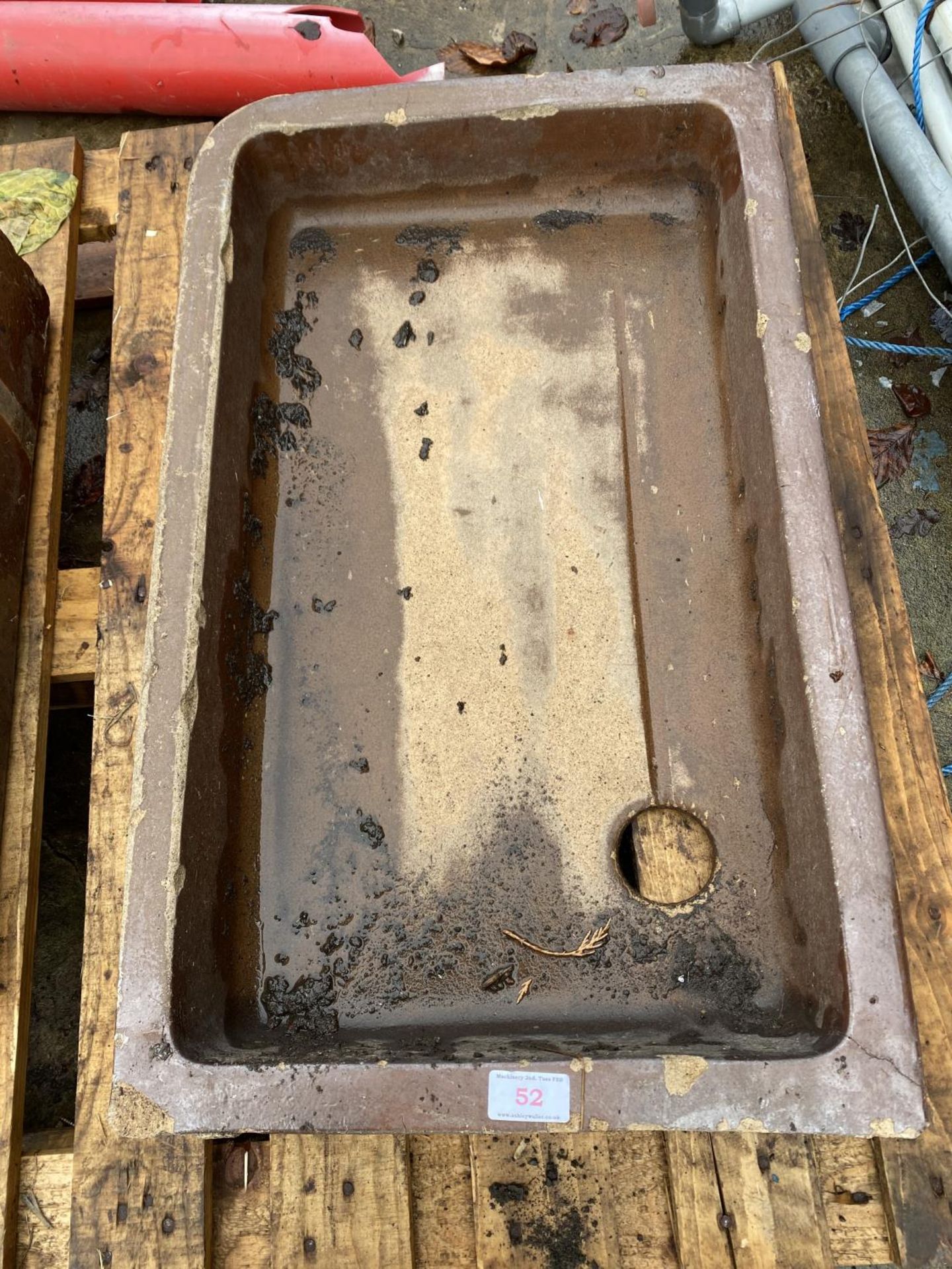 A BROWN GLAZED TROUGH 24" X 18" NO VAT