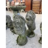 A PAIR OF LARGER STONE EFFECT SEATED LIONS