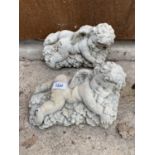 A PAIR OF STONE EFFECT CHERUB WALL PLAQUES