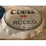 A VINTAGE STYLE 'COORS' BOTTLE TOP WALL HANGING SIGN 35CM