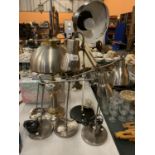 FOUR VARIOUS METAL ANGLEPOISED DESK LAMPS AND A METAL TABLE LAMP