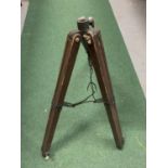 A VINTAGE WOODEN TRIPOD