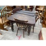 A VICTORIAN MAHOGANY WIND-OUT DINING TABLE ON TURNED AND FLUTED LEGS COMPLETE WITH THREE LEAVES,