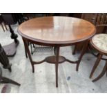 AN EDWARDIAN OVAL MAHOGANY AND INLAID TWO TIER CENTRE TABLE, 22x18"