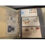 FIRST DAY COVER ALBUM CONTAINING A QUANTITY OF AUSTRALIAN COVERS + FIJI & AAT