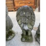 A STONE EFFECT SEATED LION