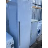 A WHITE BOSCH UPRIGHT FRIDGE BELIEVED IN WORKING ORDER BUT NO WARRANTY