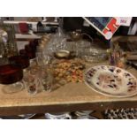 AN ASSORTMENT OF ITEMS TO INCLUDE RETRO COASTERS AND COLOURED GLASS DESSERT DISHES