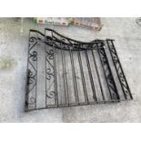 A PAIR OF DECORATIVE WROUGHT IRON GATES