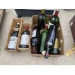 AN ASSORTMENT OF LARGE VINTAGE WINE BOTTLES, SOME TO INCLUDE BATTERY POWERED LIGHTS