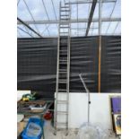 A SET OF LARGE EXTENDING LADDERS