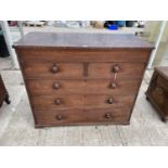 A VICTORIAN MAHOGANY CHEST OF TWO SHORT AND THREE LONG DRAWERS