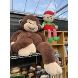 AN EXTREMELY LARGE CUDDLEY TOY MONKEY AND A FURTHER ELF TEDDY