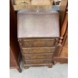 A REPRODUCTION WALNUT BUREAU, 20" WIDE